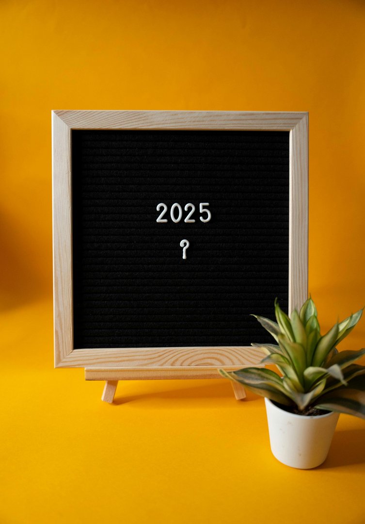 Picture frame 2025 with question mark, yellow background